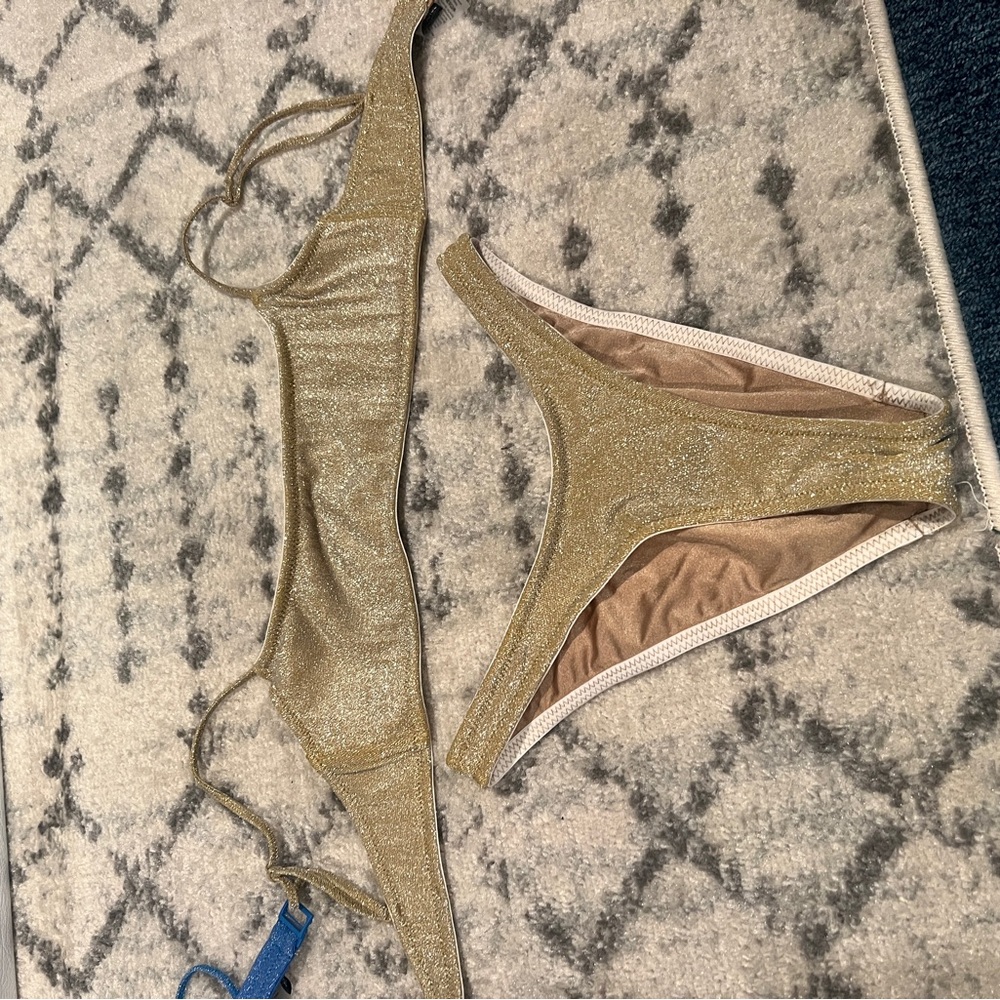 Gold triangle swim set never worn